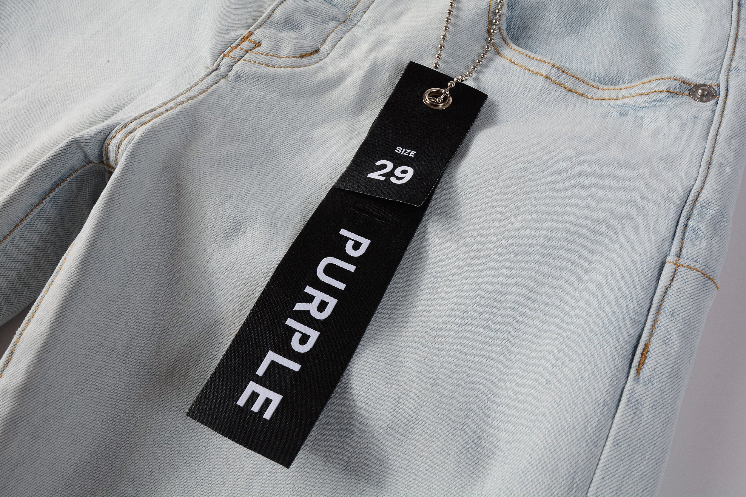 PURPLE  Men Streetwear Skinny Jeans Light Gray Wash with Minimalist Style and Tag Accent 9081